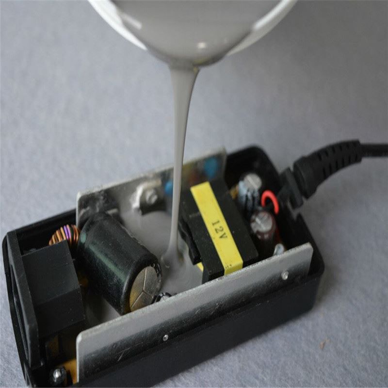 Thermal conductive potting adhesive
